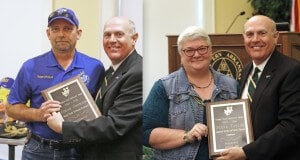 SAU President Dr. Trey Berry presented Edgar Johnson, left, and Deana Taylor, the Staff Excellence Awards.